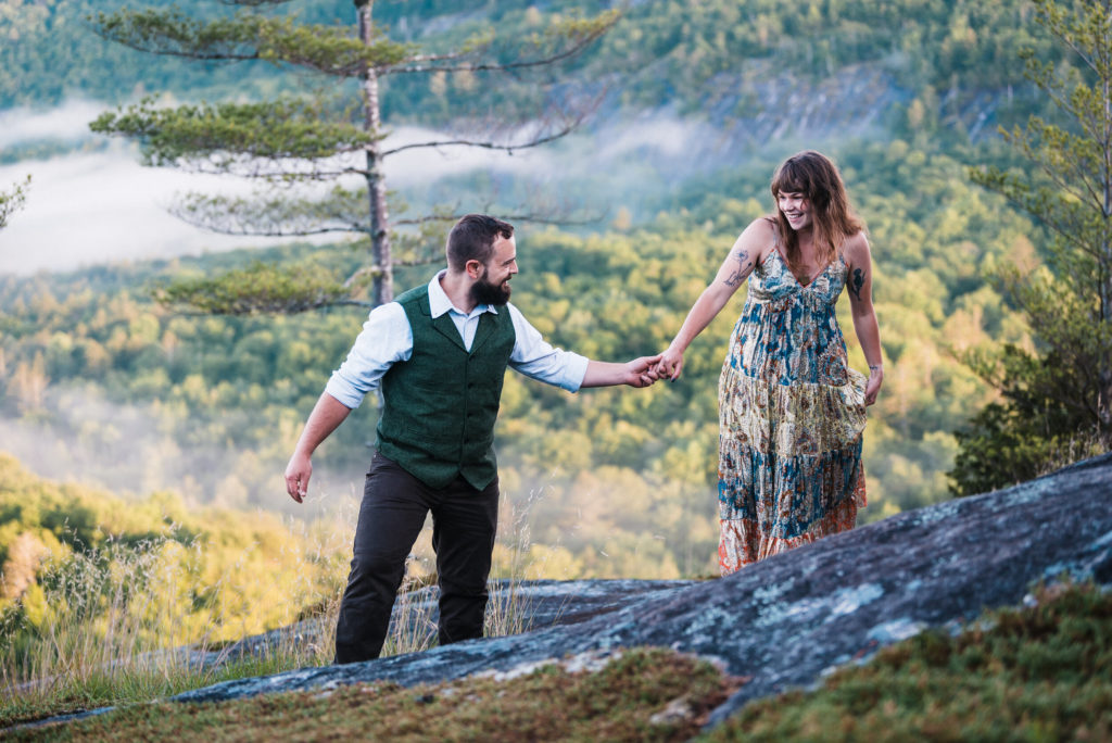 Couple walking in the mountains together after eloping in North Carolina