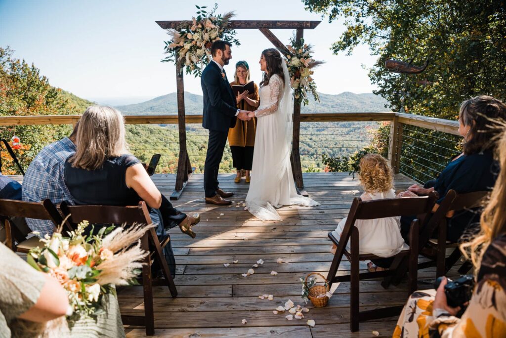 Couple eloping at their mountain Airbnb